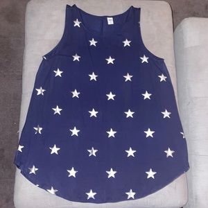 Sleeveless blue top with stars